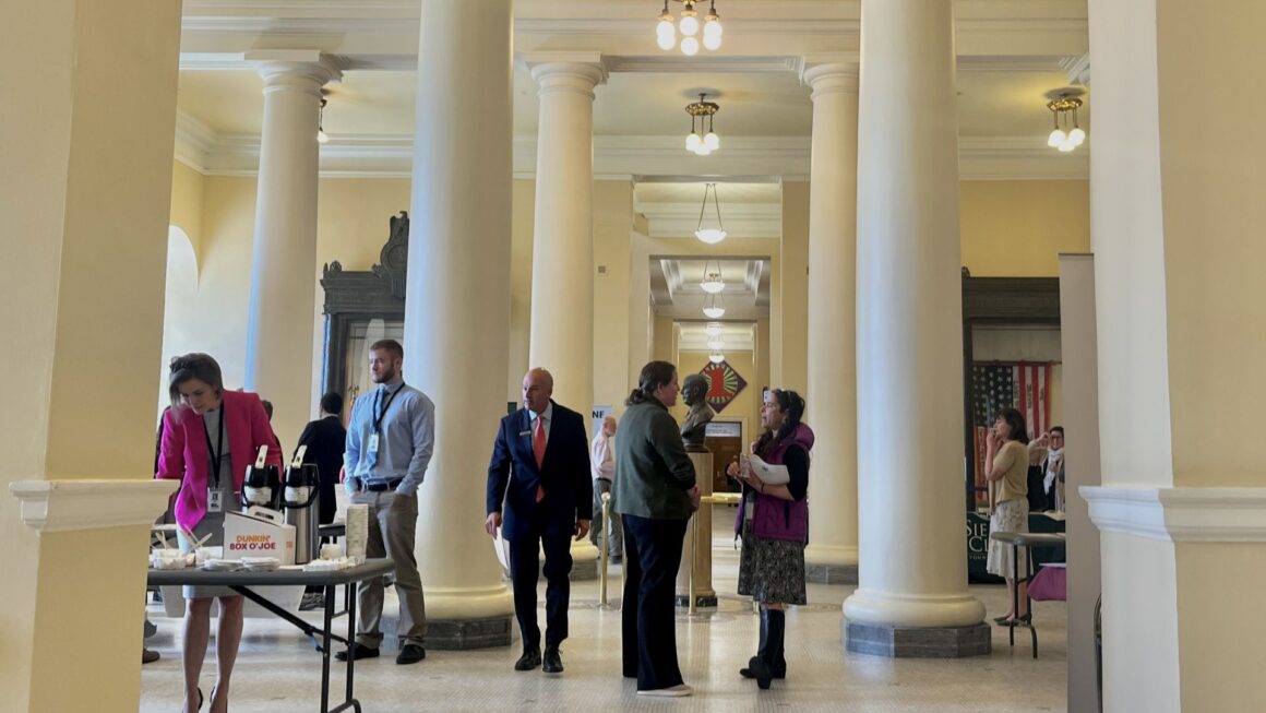 advocates gather in the halls of the statehouse.