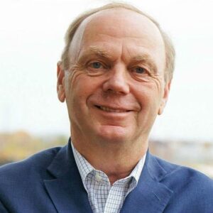 headshot of reporter Alan Caron