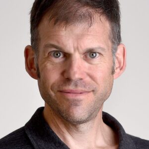 headshot of reporter John Blodgett