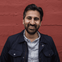 headshot of reporter Zahir Janmohamed