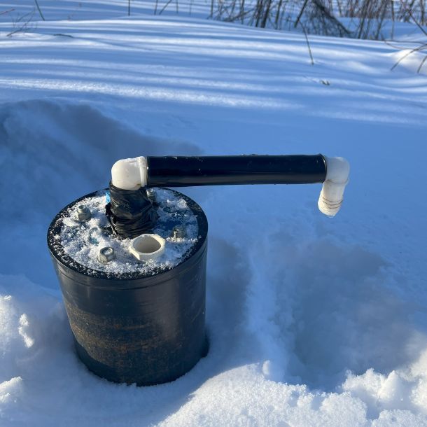 hand pump operated water well.