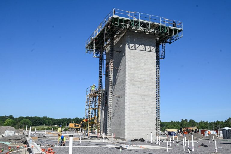 stair and elevator towers under construction.