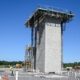 stair and elevator towers under construction.