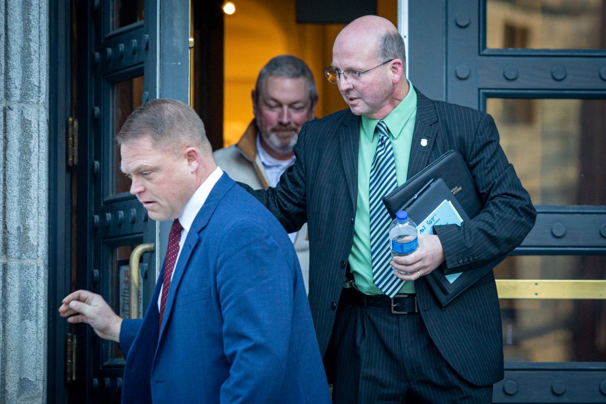 Brian Scott exits a building.