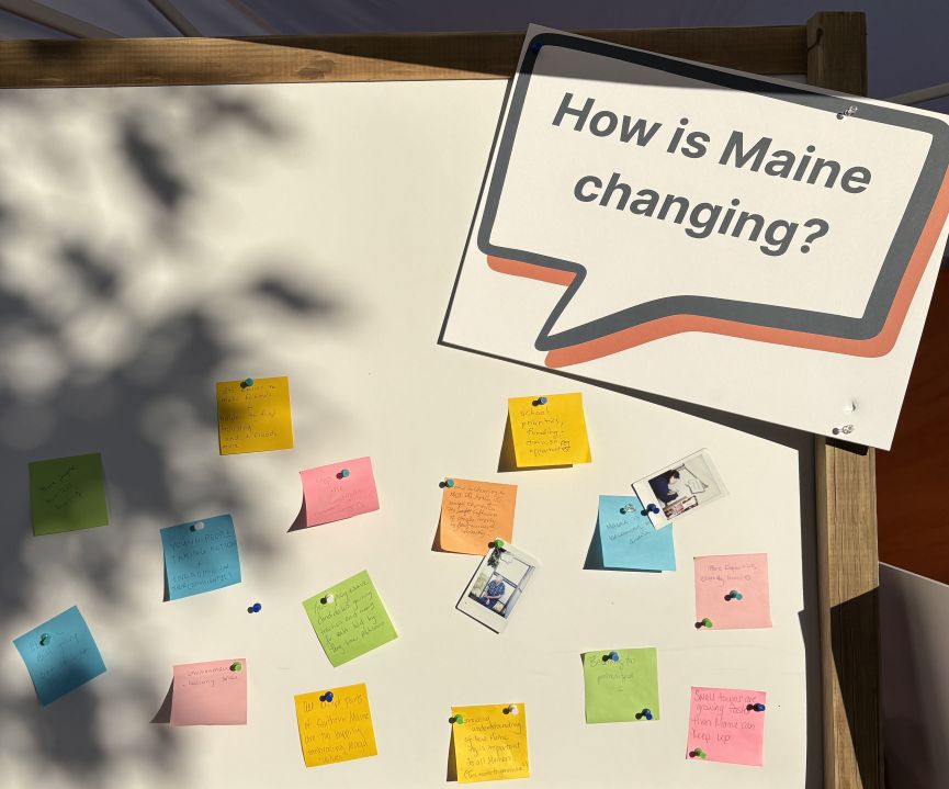 Fair attendees wrote their thoughts on how Maine is changing onto sticky notes.