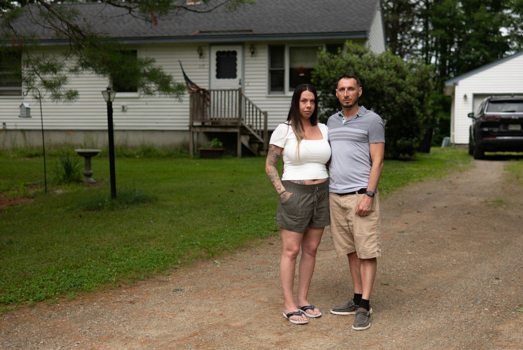 Shawna Morse and Justin Savage pose for a photo.