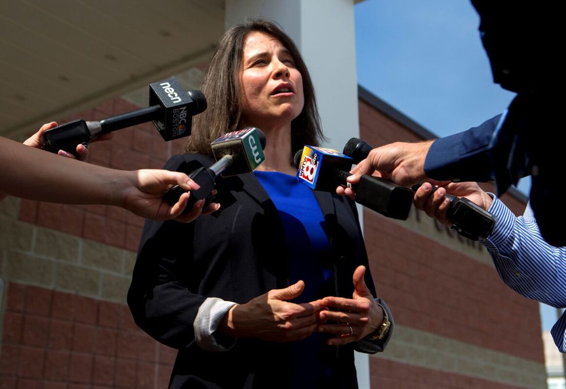 Maeghan Maloney speaking with members of the media.