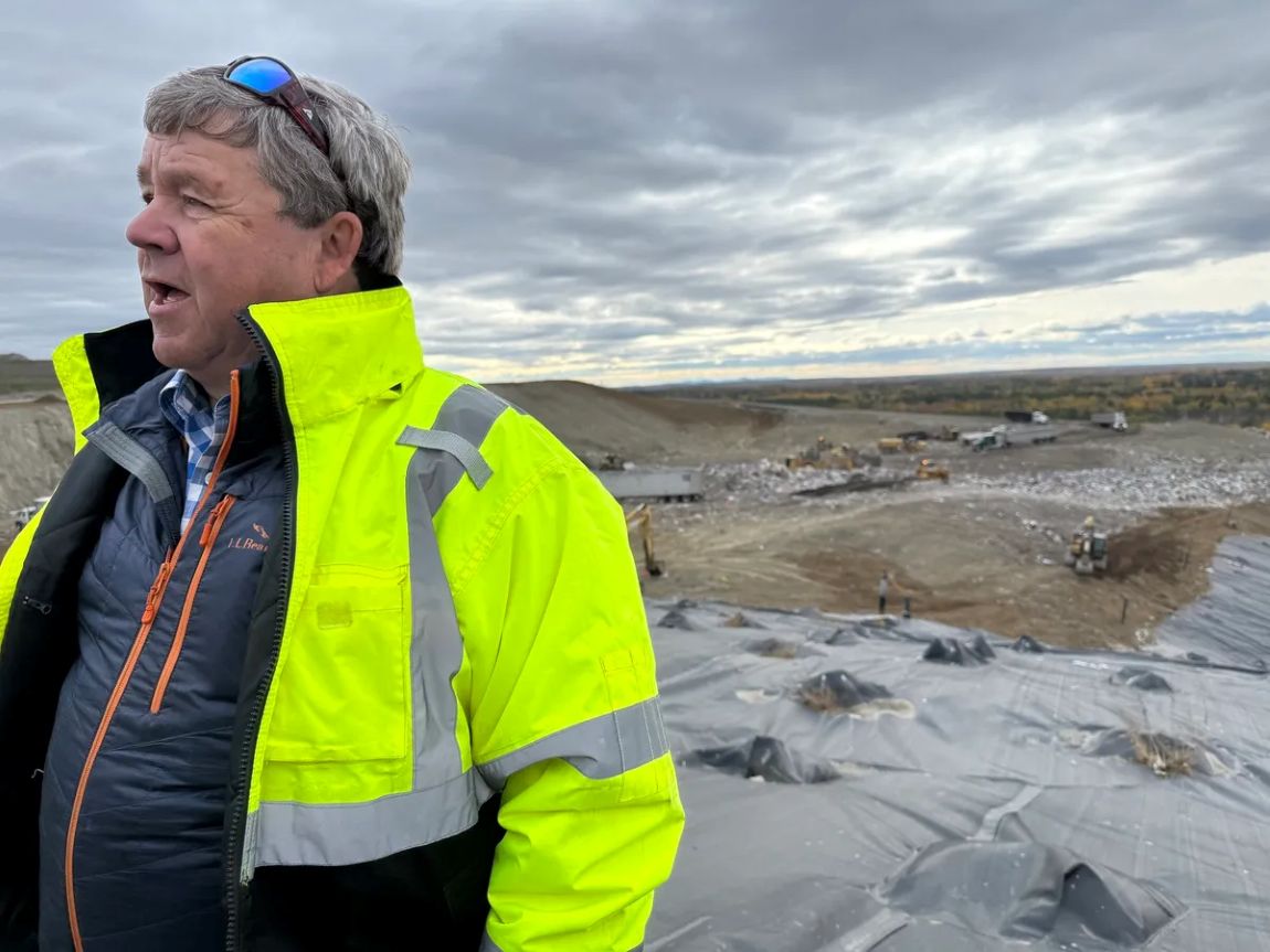 Wayne Boyd speaks with a reporter.
