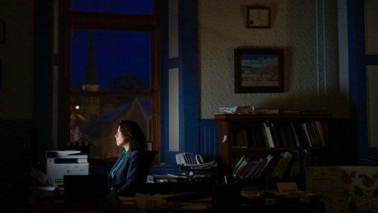 Maeghan Maloney working at her desk.