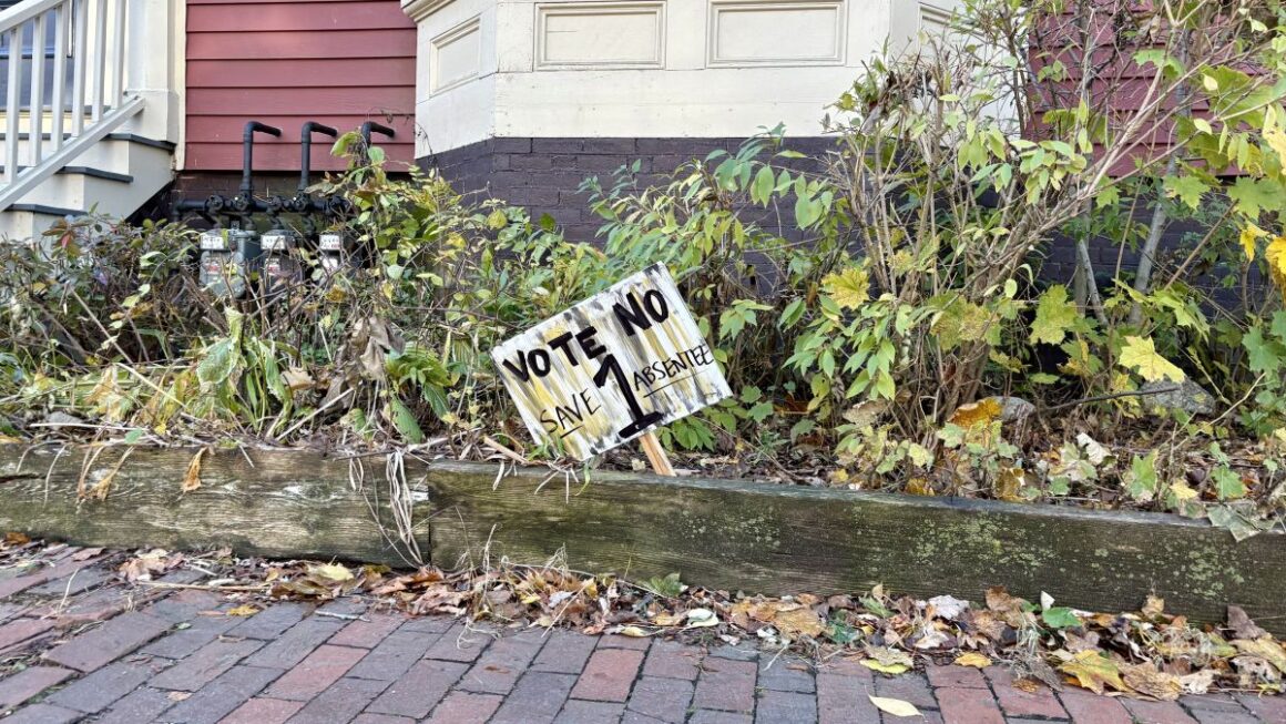 a sign urging voters to vote no on Question 1.