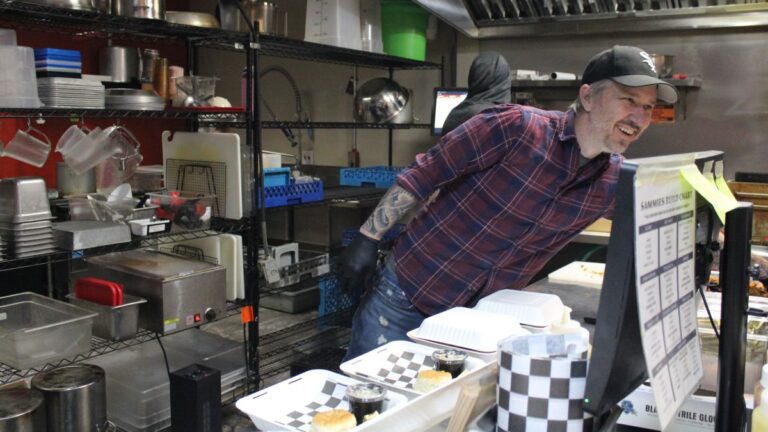Malcolm Bedell working in the kitchen.