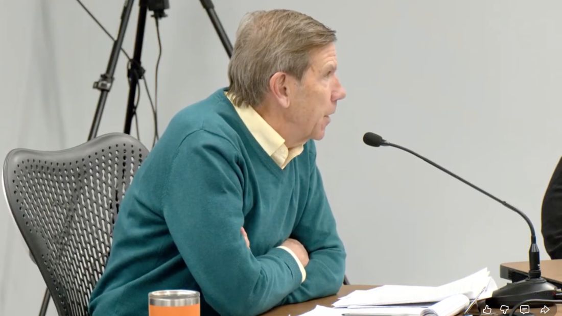 Cornell Knight speaks during a meeting.