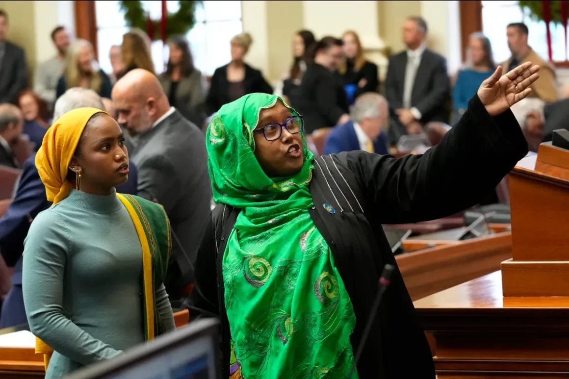 State reps Mana Abdi and Deqa Dhalac in the statehouse