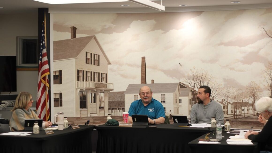 the norway select board during a meeting.