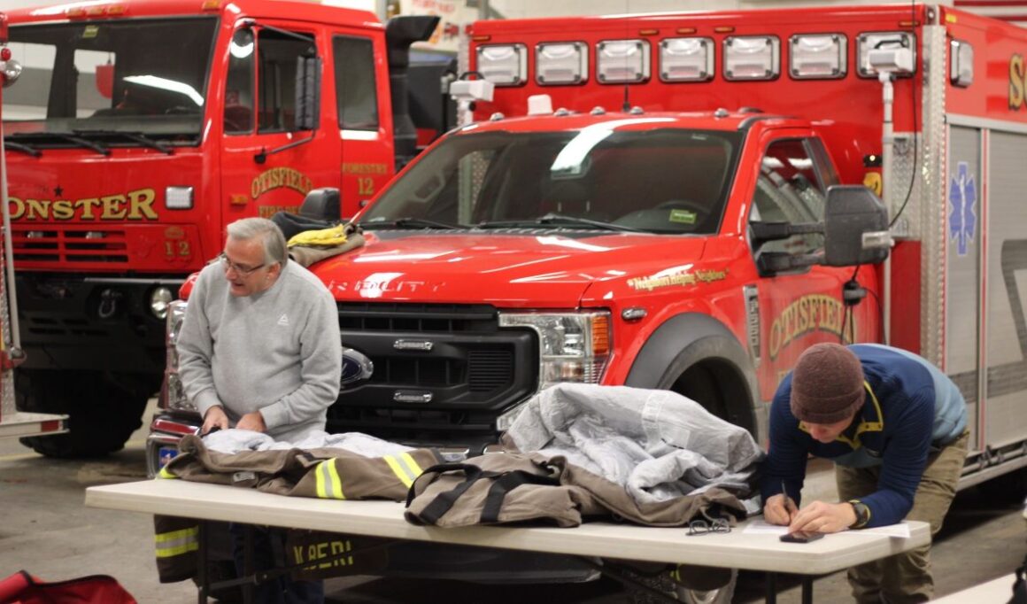 Men inspecting emergency response gear.