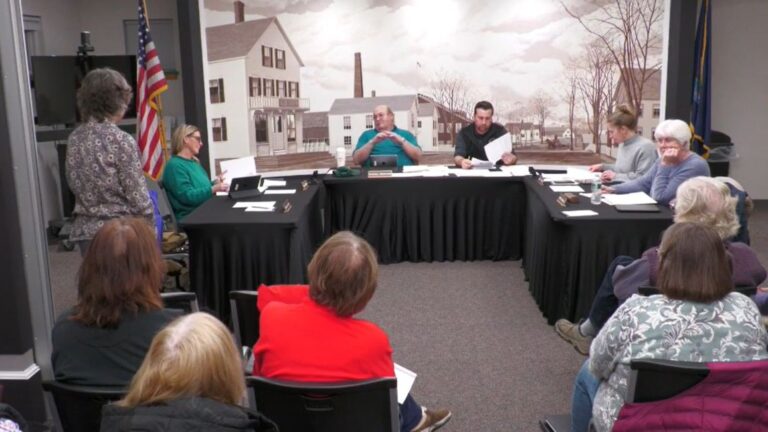 a resident speaks during a select board meeting.