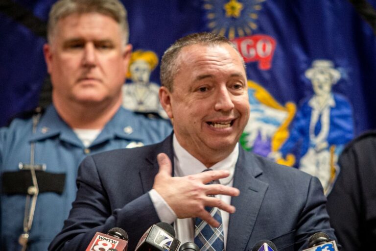 Michael Sauschuck during a press conference.