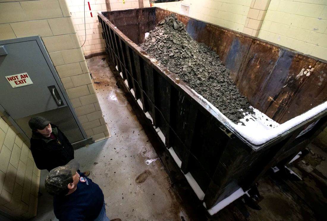 container filled with biosolids 