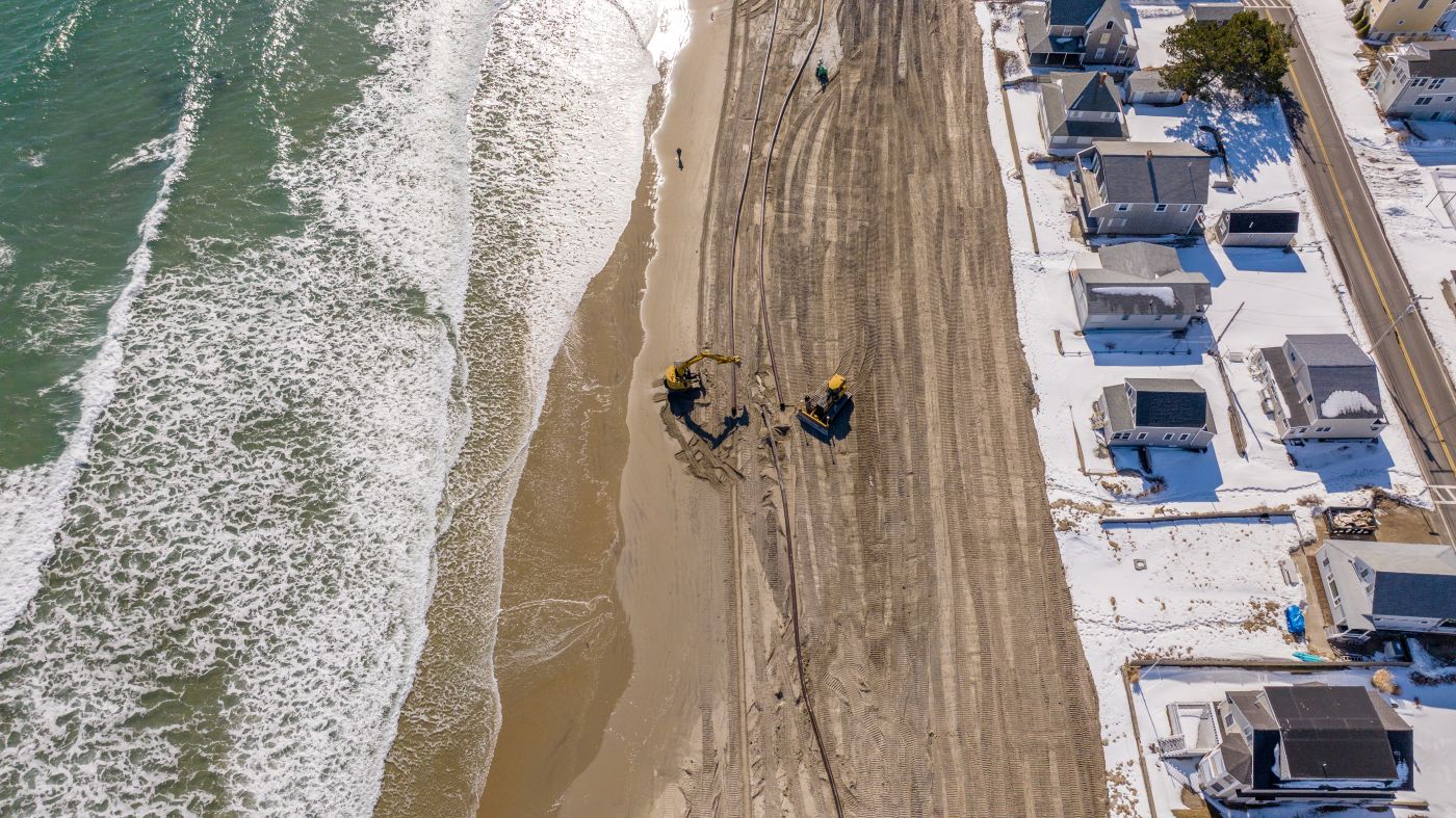 aerial view of construction equipment on the beach