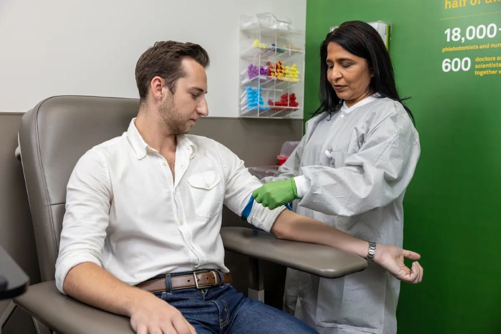 A patient has his blood drawn. 