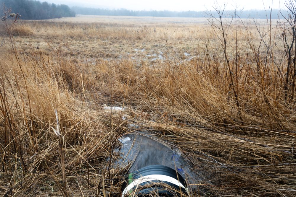 a field with a culvert