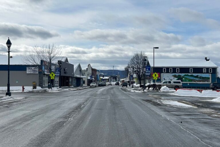 buildings line both sides of a street in fort kent
