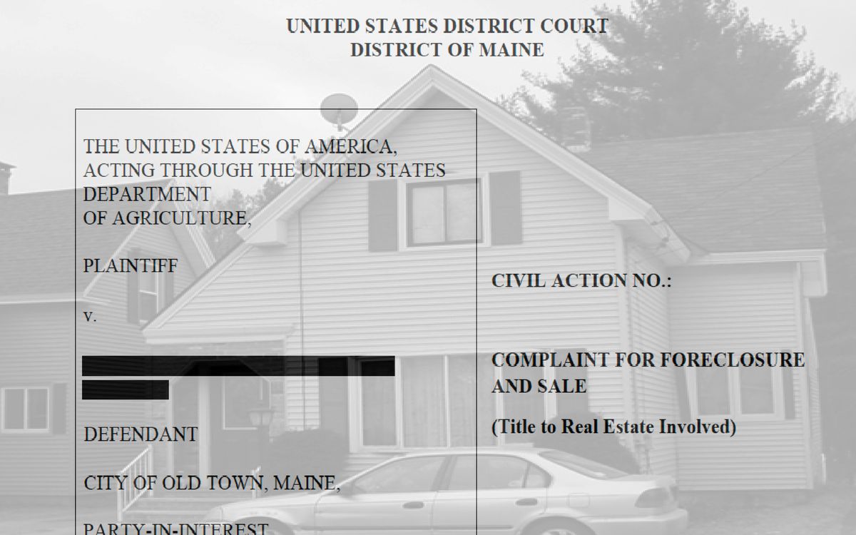 the cover page of a court filing overlayed on an image of a home.