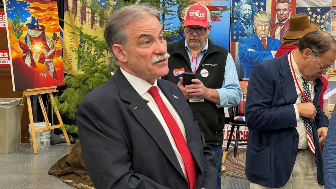 Bobby Charles speaking with an individual (not pictured).