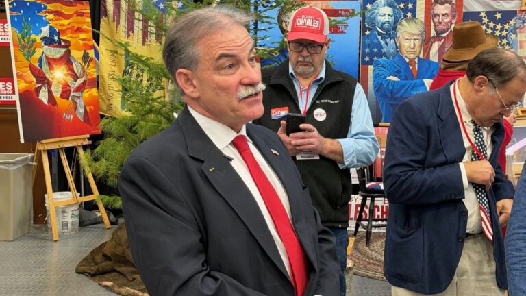 Bobby Charles speaking with an individual (not pictured).