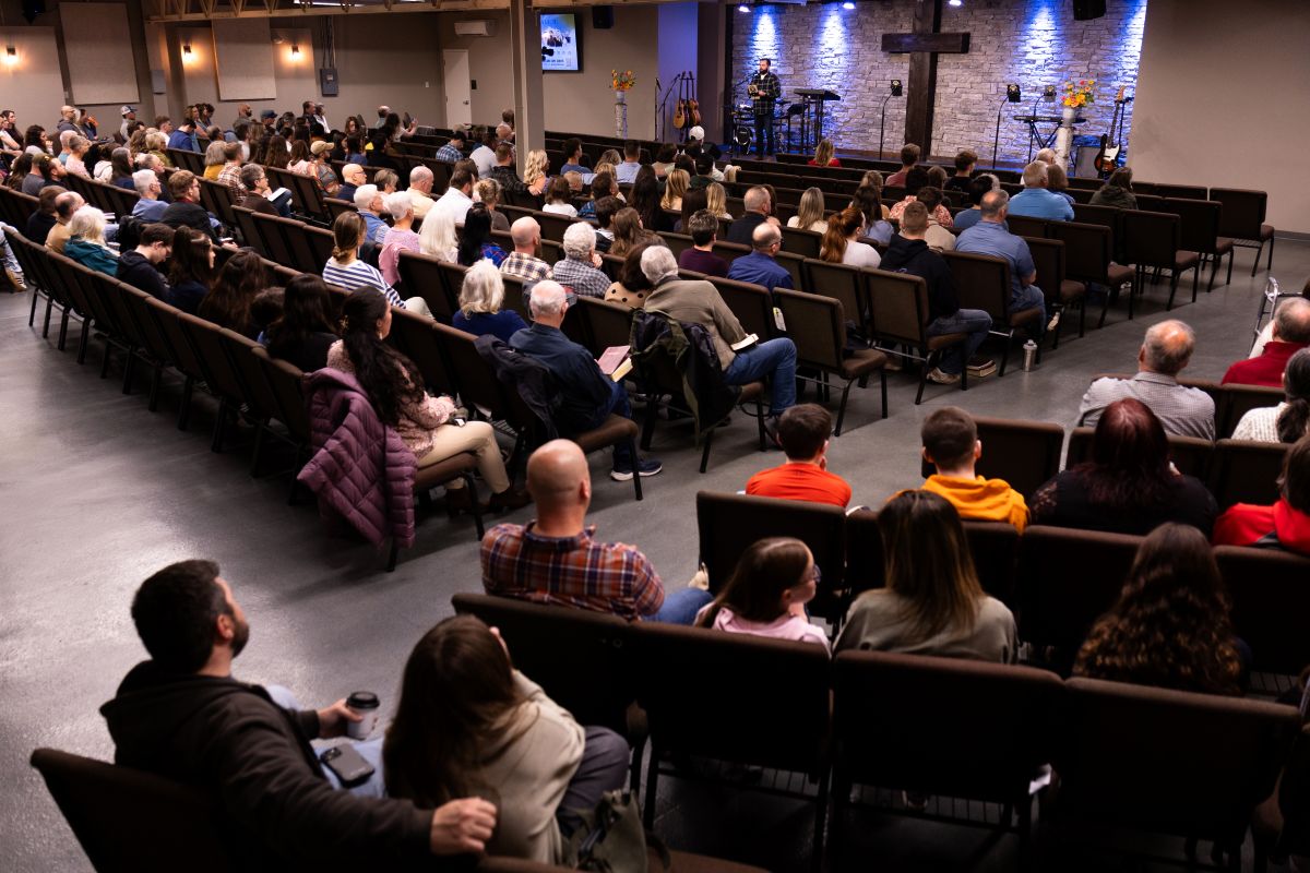 congregants listen to a church sermon