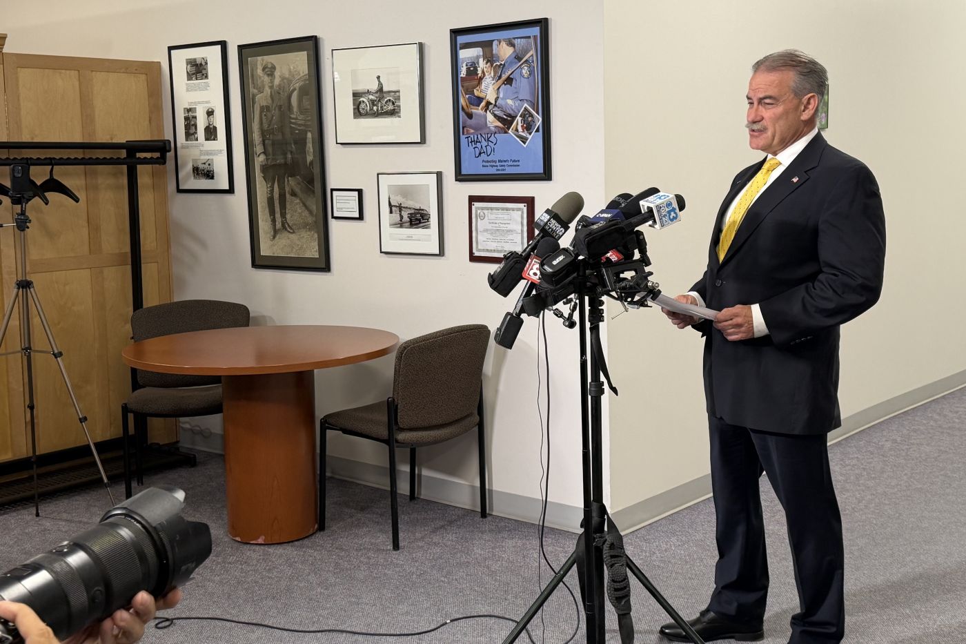 Bobby Charles speaks during a press conference.