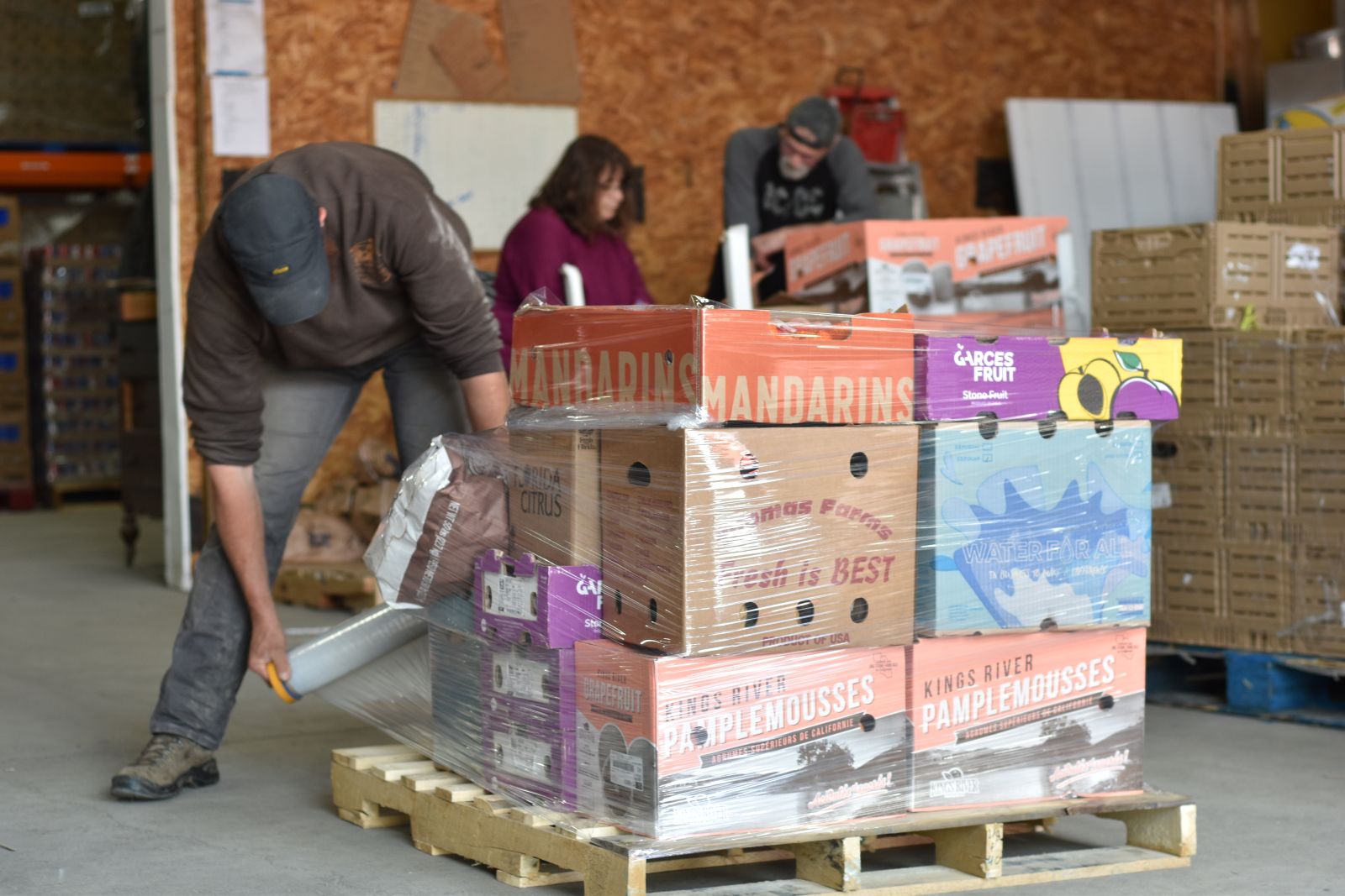 boxes of produce on a pallet