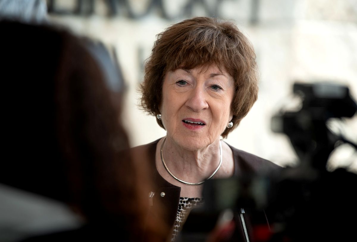 Susan Collins speaking with reporters.