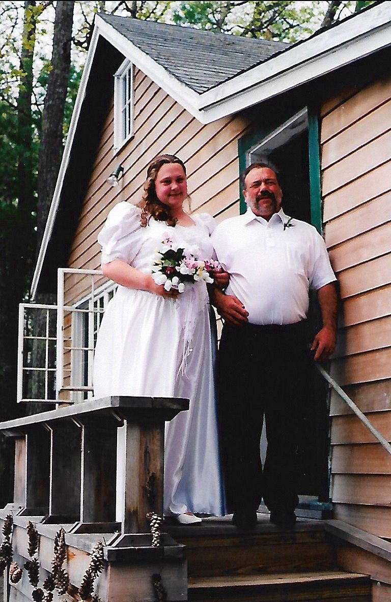 Aimee and Fritz pose for a photo ahead of her wedding.