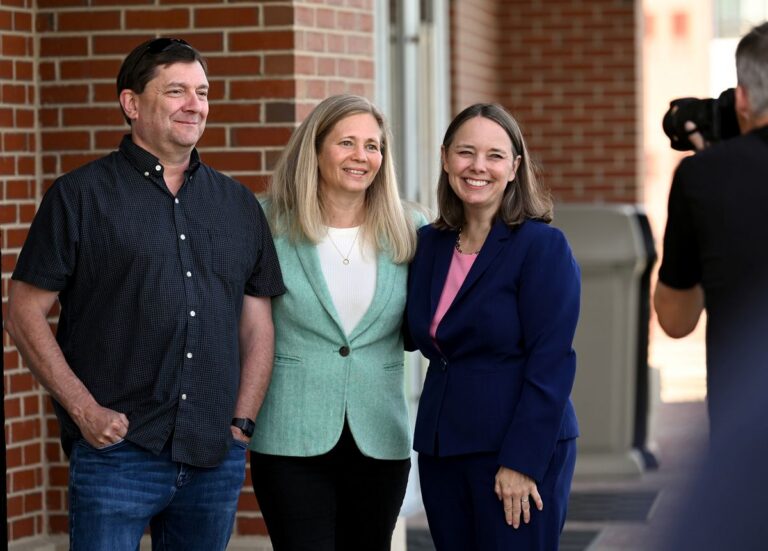 Troy Jackson, Hannah Pingree and Shenna Bellows pose for a photo.