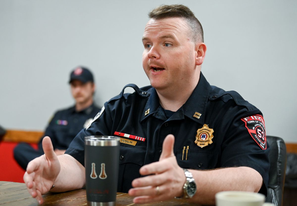 Ken Goslin speaking during a meeting.