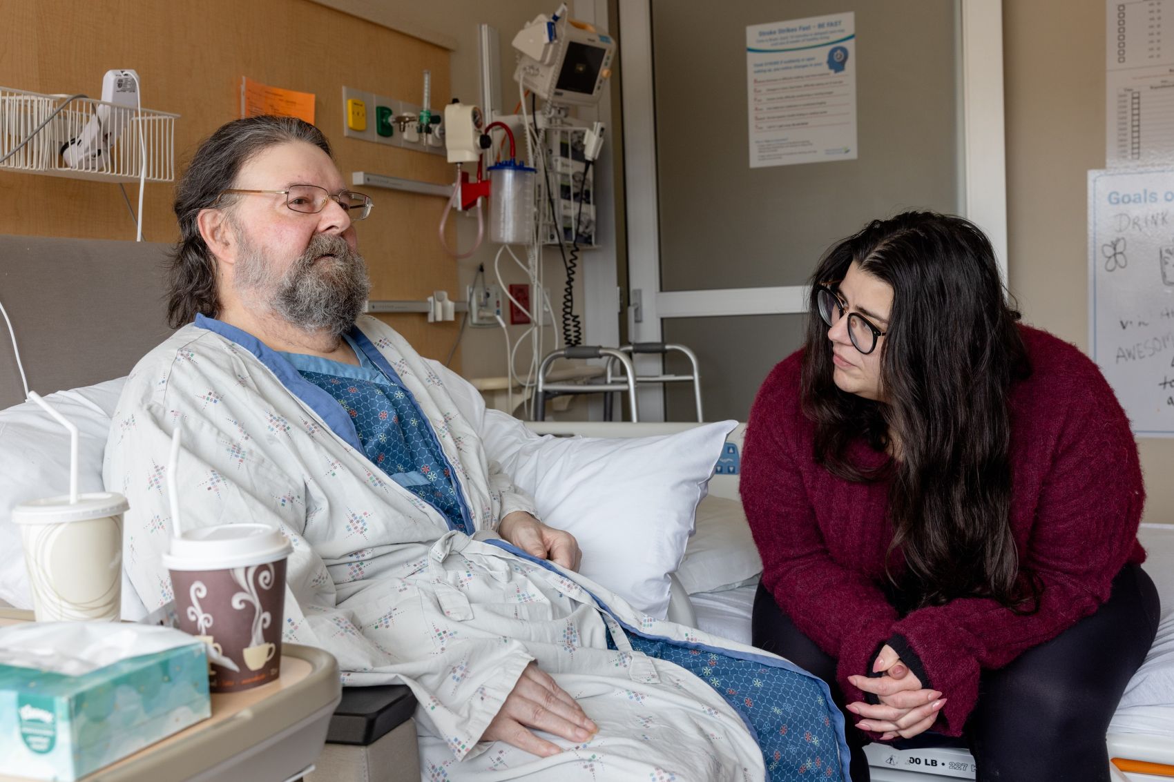 The Lauzons in his hospital room.