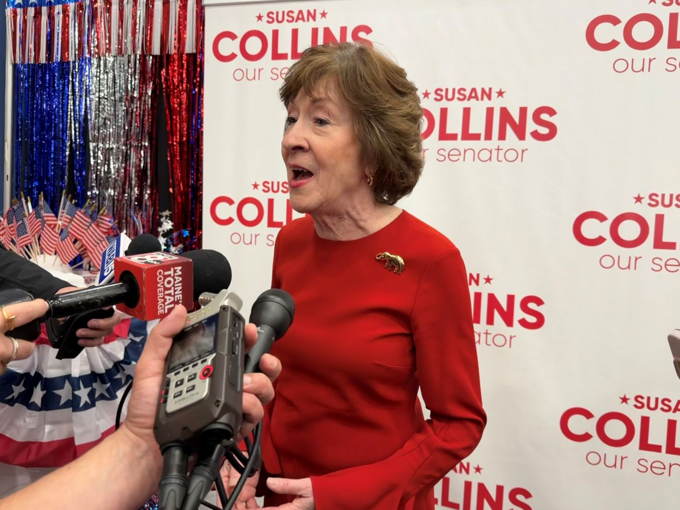 Susan Collins speaking with reporters.