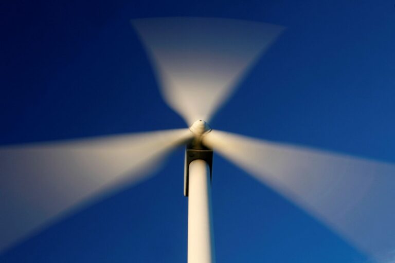 Blades rotate on a wind turbine