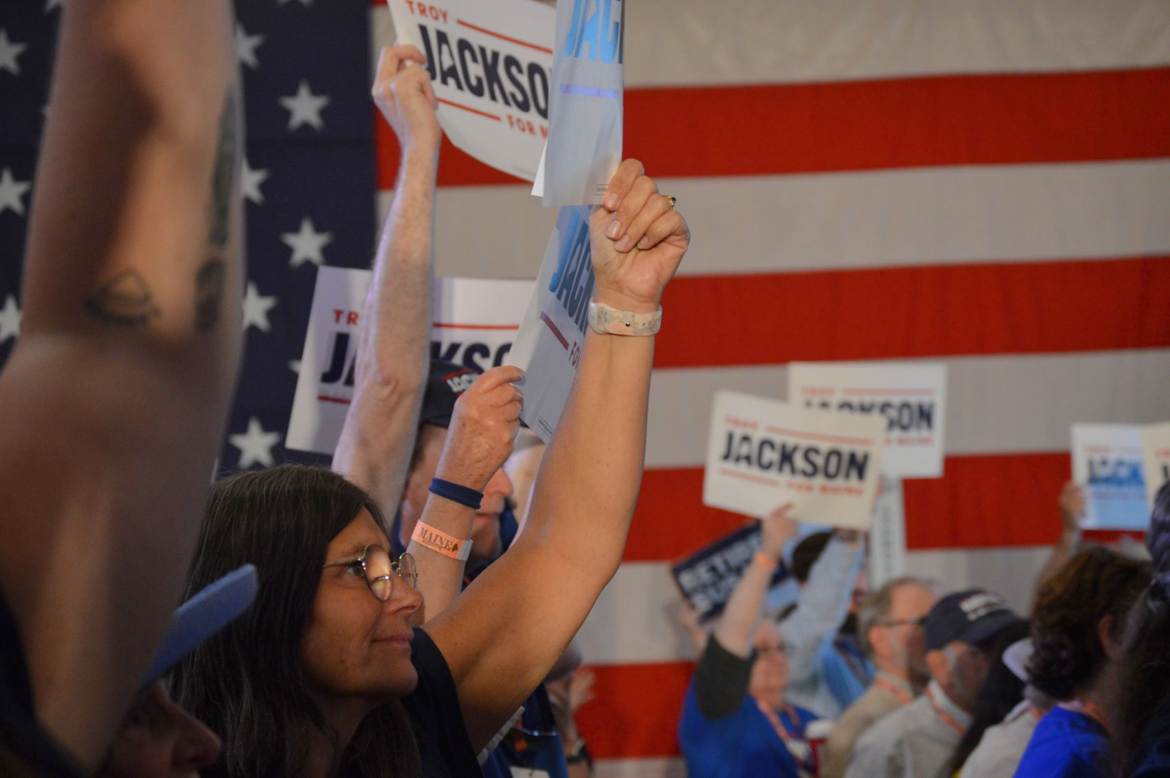 troy jackson supporters holding signs