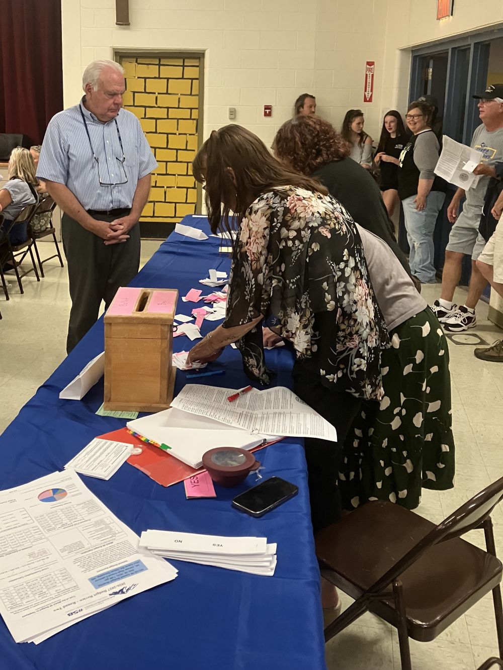 Ken Lexier watches as ballot clerks count votes