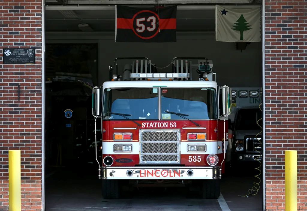 a fire truck inside a fire station