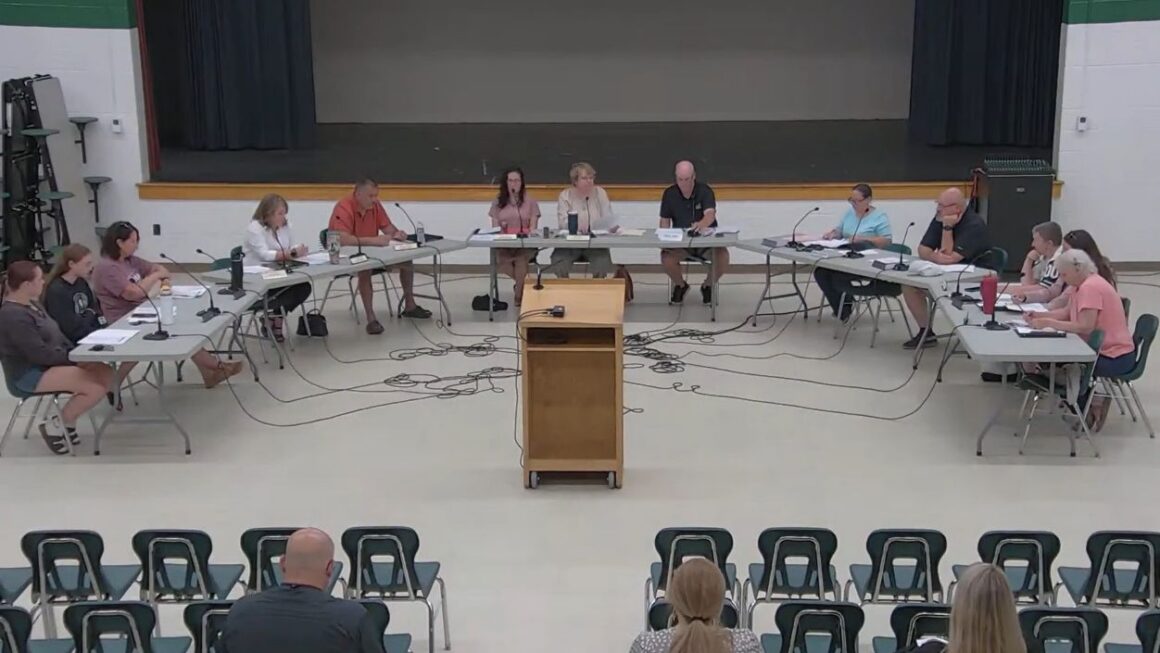 Members of the RSU 73 board during a meeting.
