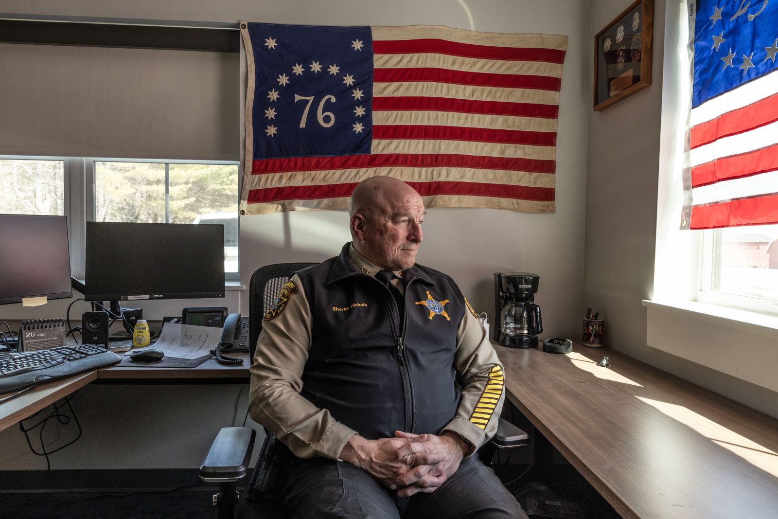 Franklin County Sheriff Scott Nichols poses for a photo while sitting in his office.
