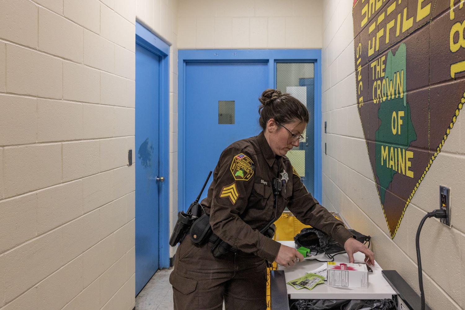 An officer organizes information and supplies