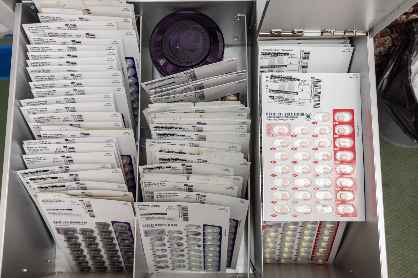 a drawer full of pills
