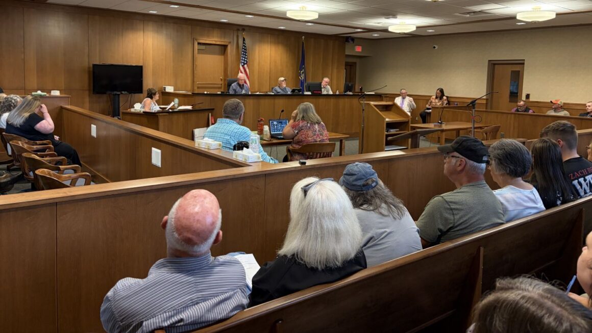 people listen to the washington county commission meeting.