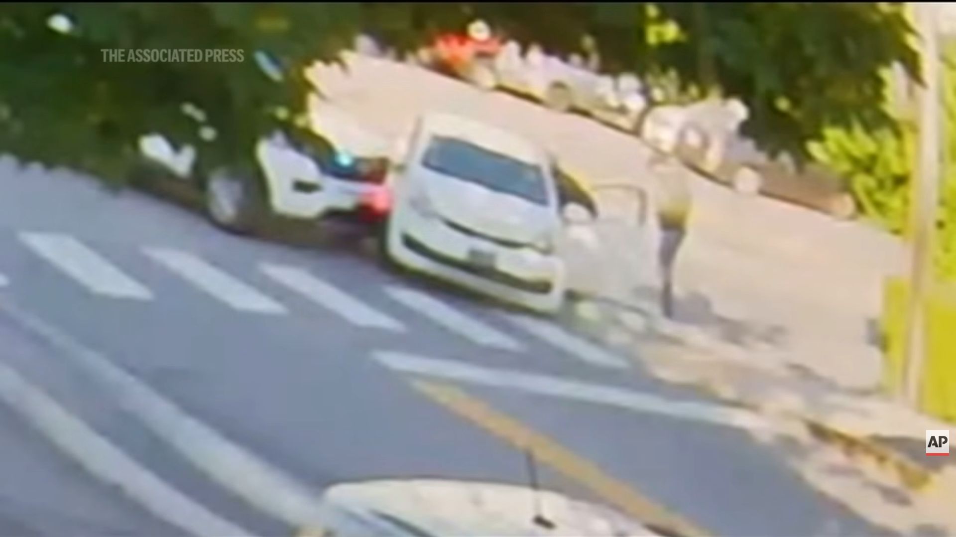 a still from a video that shows the two cars involved.