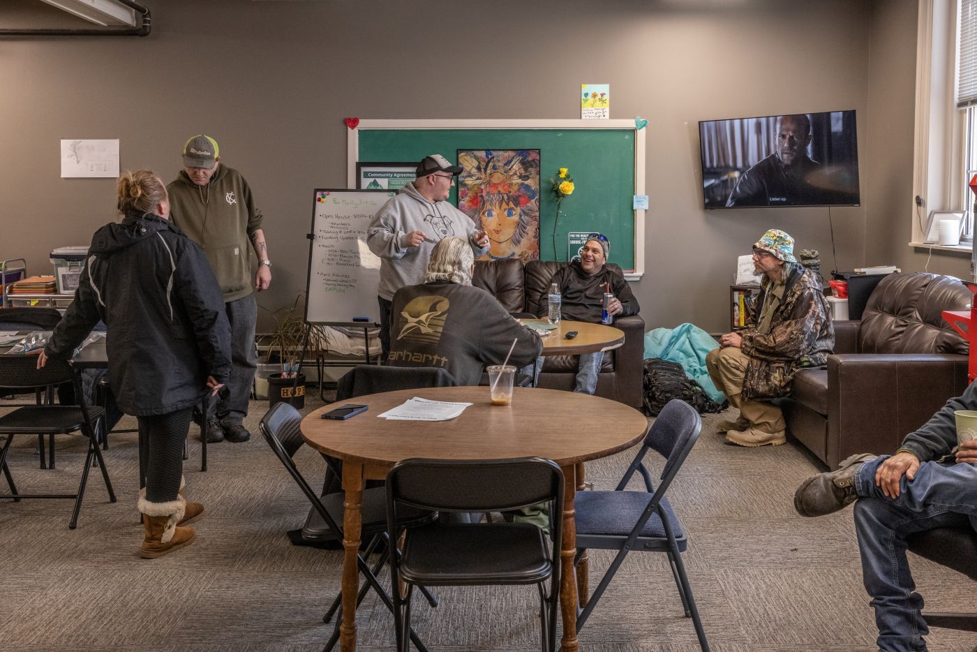 a group of visitors socializing at the franklin recovery center