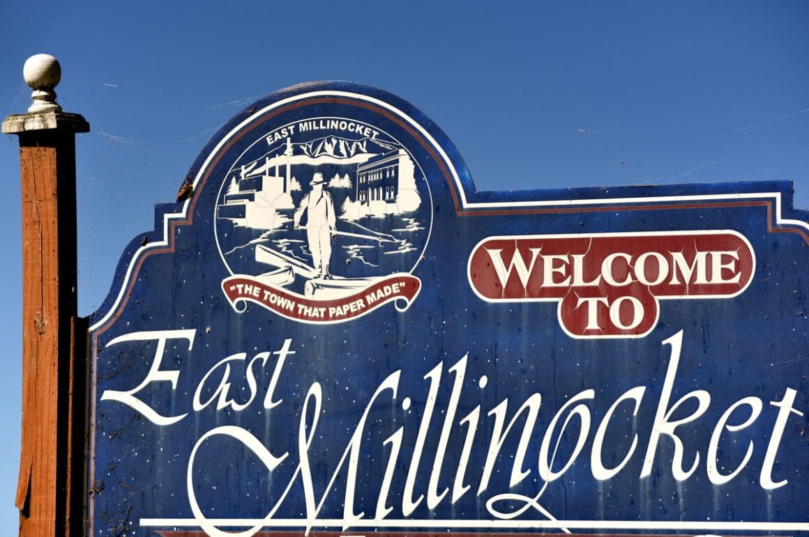 sign that reads welcome to east millinocket.